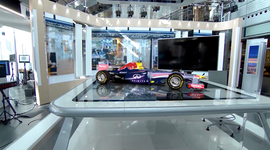 An F1 car is placed into a studio via Unreal augmented reality